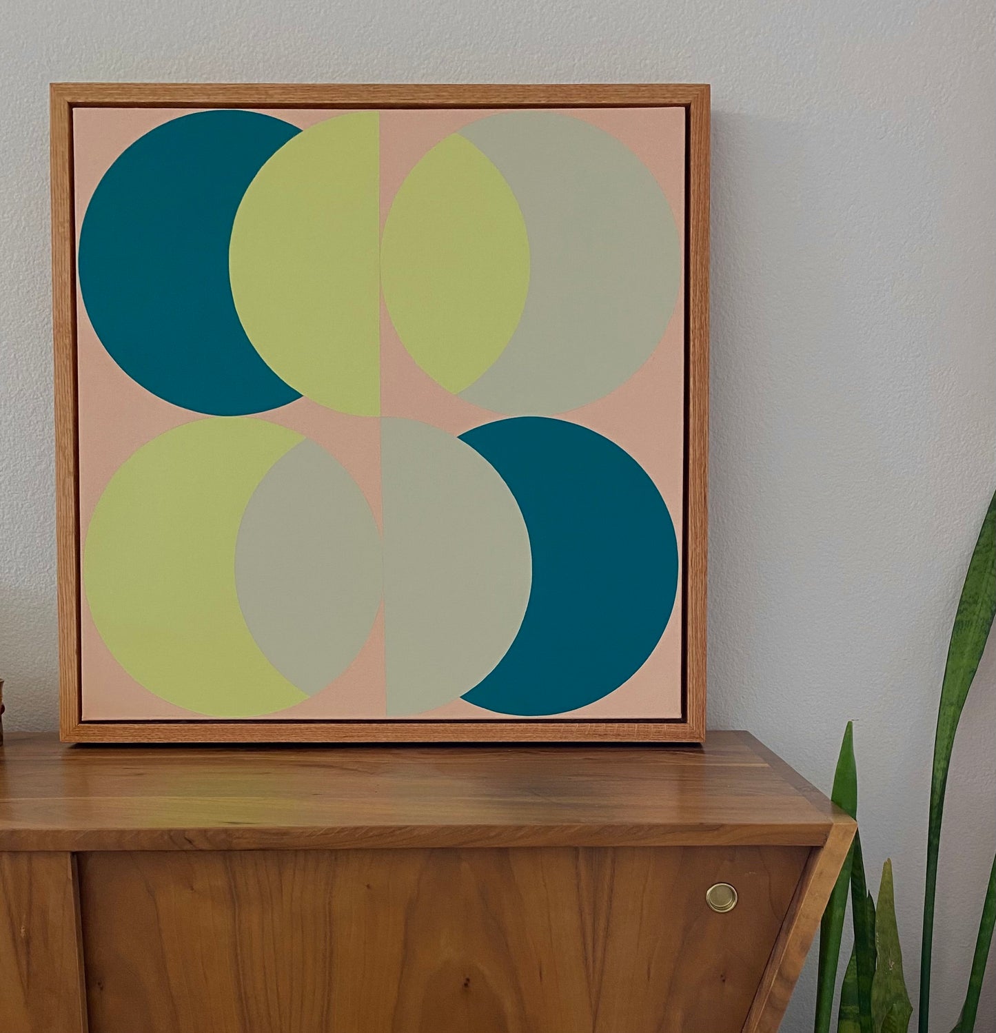 Midcentury modern style contemporary geometric fine art acrylic painting on canvas. Groovy 1960s 1970s color palette. Framed in tea stained, oil rubbed oak. Handmade in Palm Springs, California.